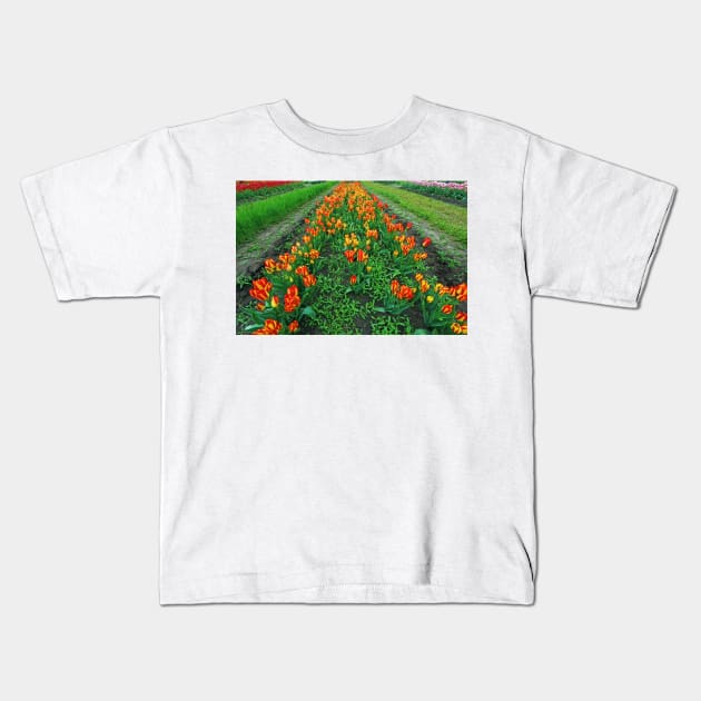 Orange Tulips Kids T-Shirt by ikshvaku